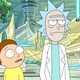 Morty and Rick of Rick and Morty walk together in a sci-fi landscape.